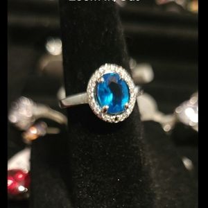 Beautiful Dimond candle ring. Blue stone reminds me of the blue ocean